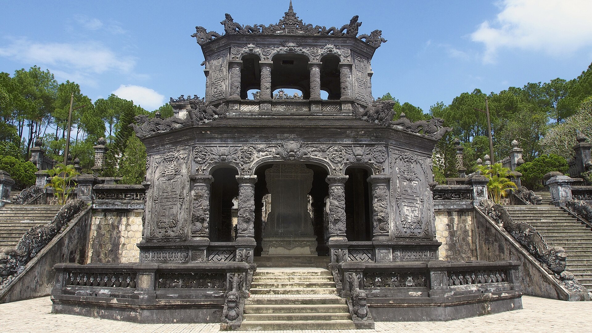 The stone gateway and broad stairs leading into Khải Định’s tomb complex near Huế.